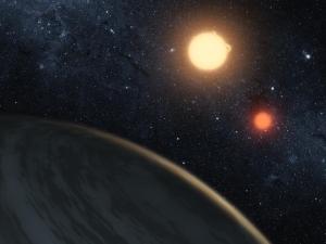 Recreación artística de Kepler-16b y sus dos soles 